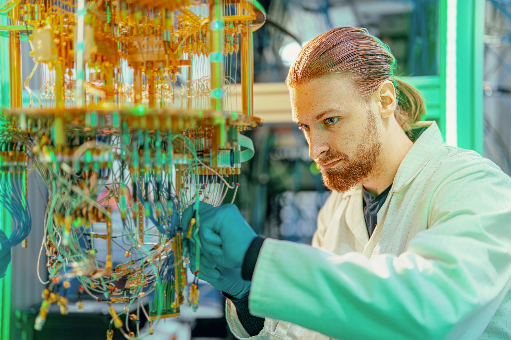 Vladimir Milchakov working with a superconducting quantum computer at IQM Quantum Computers